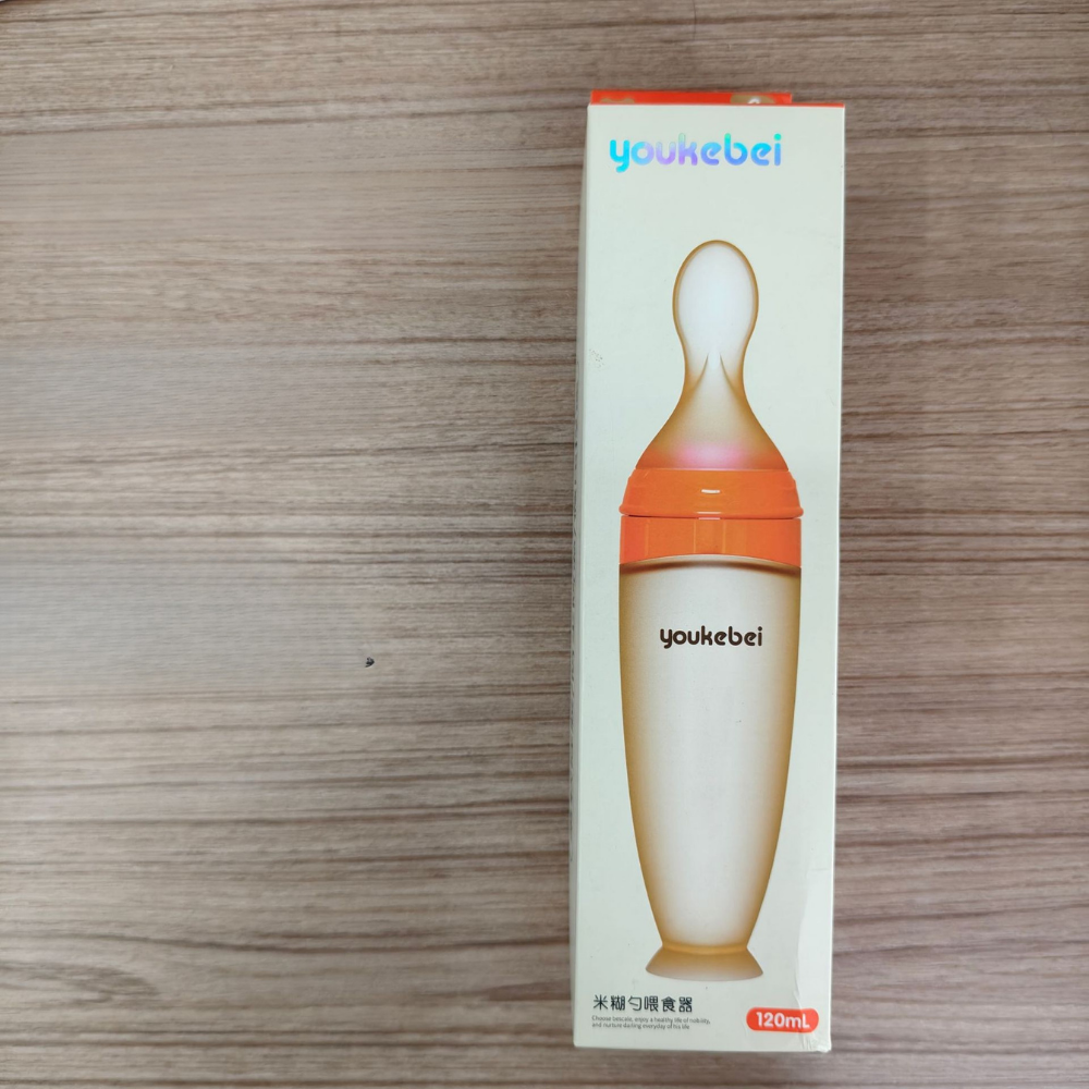 silicone baby feeding spoon bottle helping to introduce new flavors and textures into the baby's diet without the need for additional utensils