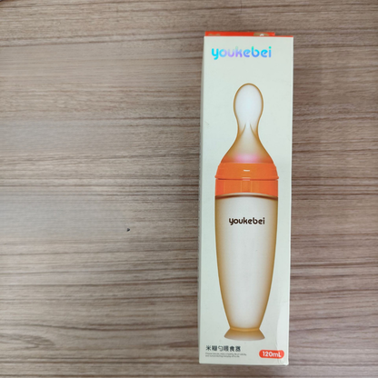 silicone baby feeding spoon bottle helping to introduce new flavors and textures into the baby's diet without the need for additional utensils
