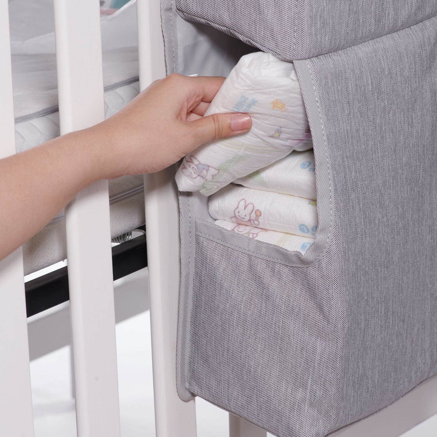 3-in-1 Crib Organizerorganize the diapers by hand