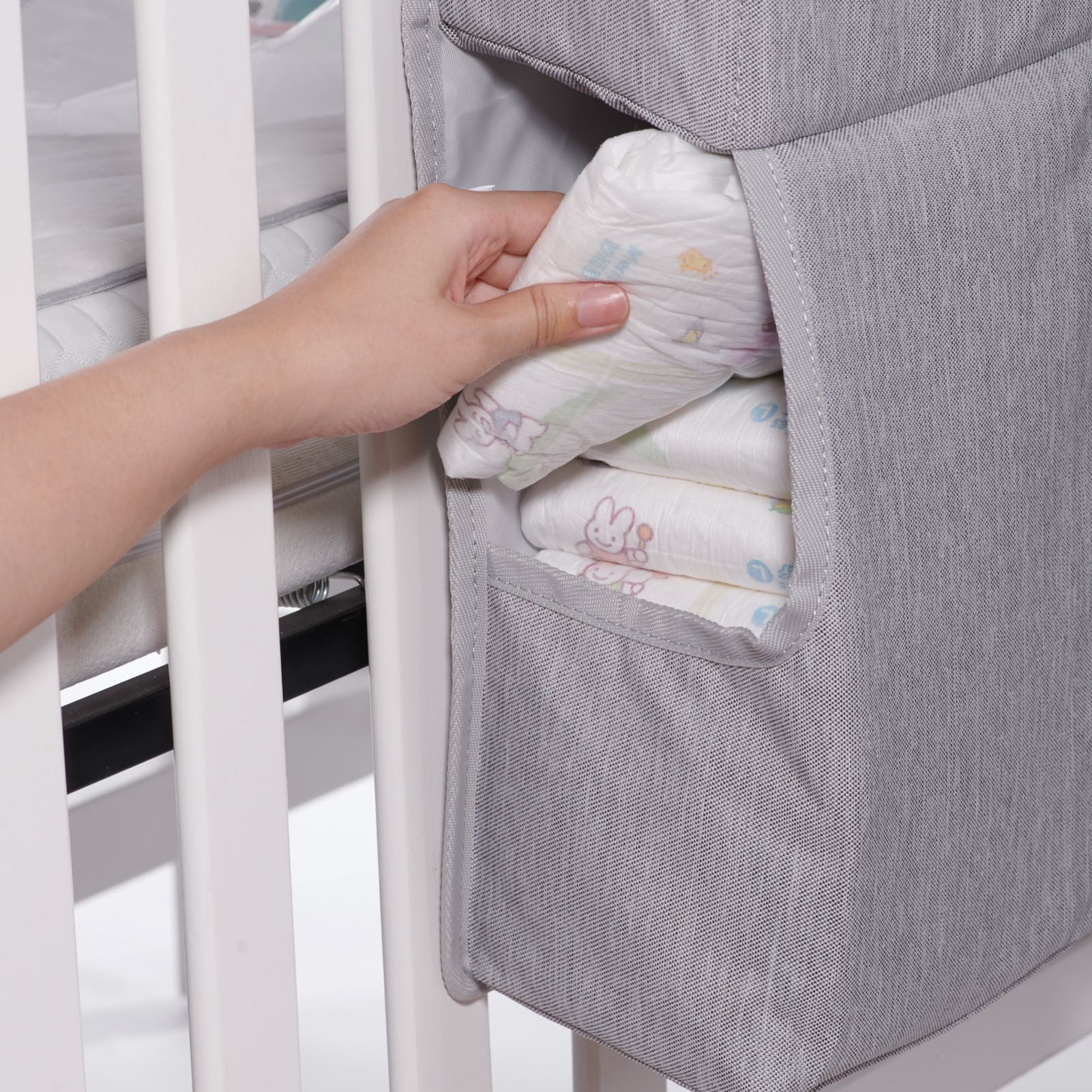3-in-1 Crib Organizerorganize the diapers by hand