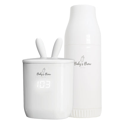 White Baby's Brew portable bottle warmer beside a formula dispenser by Mama's Dream