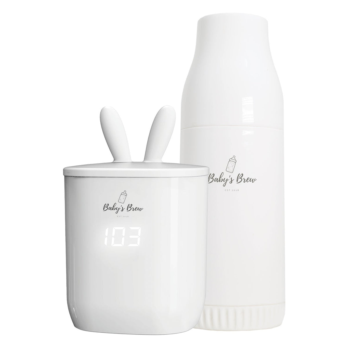 White Baby's Brew portable bottle warmer beside a formula dispenser by Mama's Dream