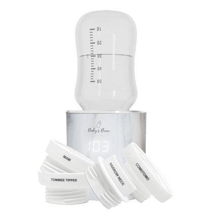 Marble finish Baby's Brew portable bottle warmer with measuring container and four bottle adapters by Mama's Dream