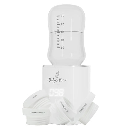 Baby's Brew portable bottle warmer with measuring container and bottle adapters on a white background by Mama's Dream