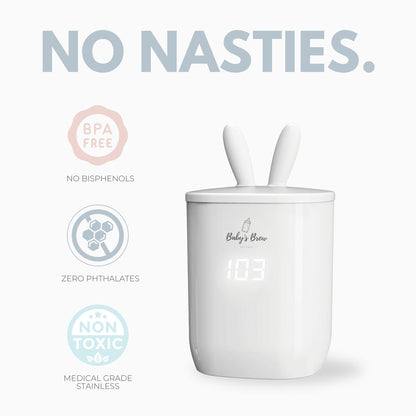 Baby's Brew portable bottle warmer with bunny ear cap and infographic stating BPA free, no phthalates, and medical grade stainless steel by Mama's Dream
