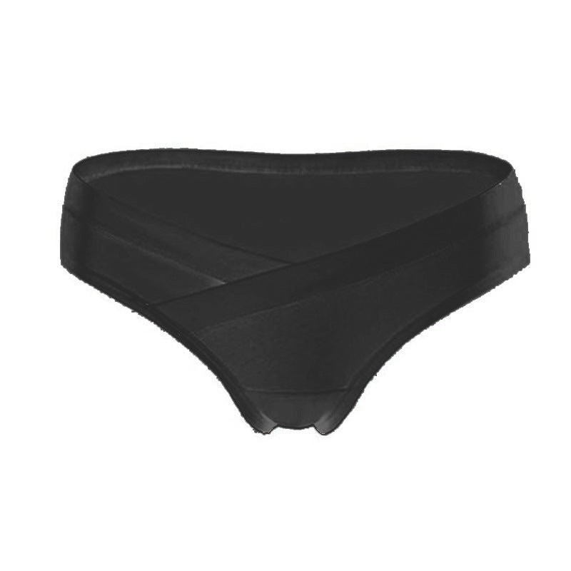 Black maternity underwear with a crossover waistband that sits below the belly, shown on a white background by Mama's Dream