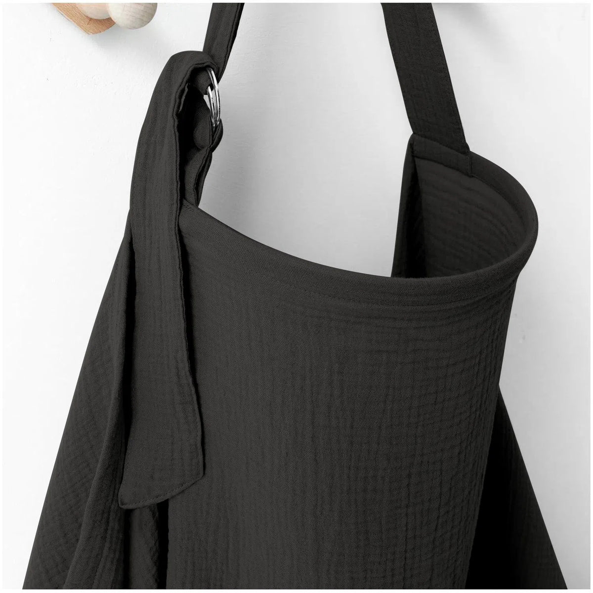 Black nursing cover for breastfeeding with adjustable shoulder strap and metal ring by Mama's Dream