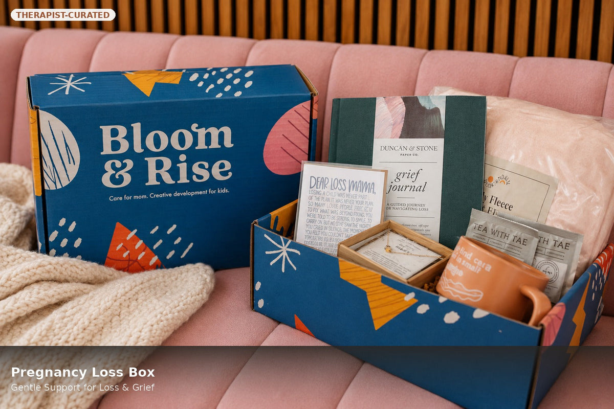 Bloom & Rise pregnancy loss support box with a grief journal, blanket, tea and mug by Mama's Dream