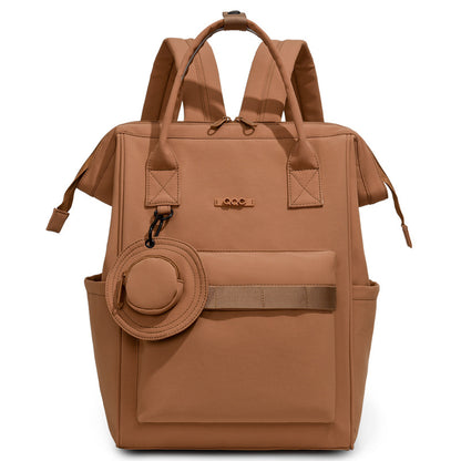 Brown convertible diaper bag backpack with top handles, side pockets and front storage compartment by Mama's Dream