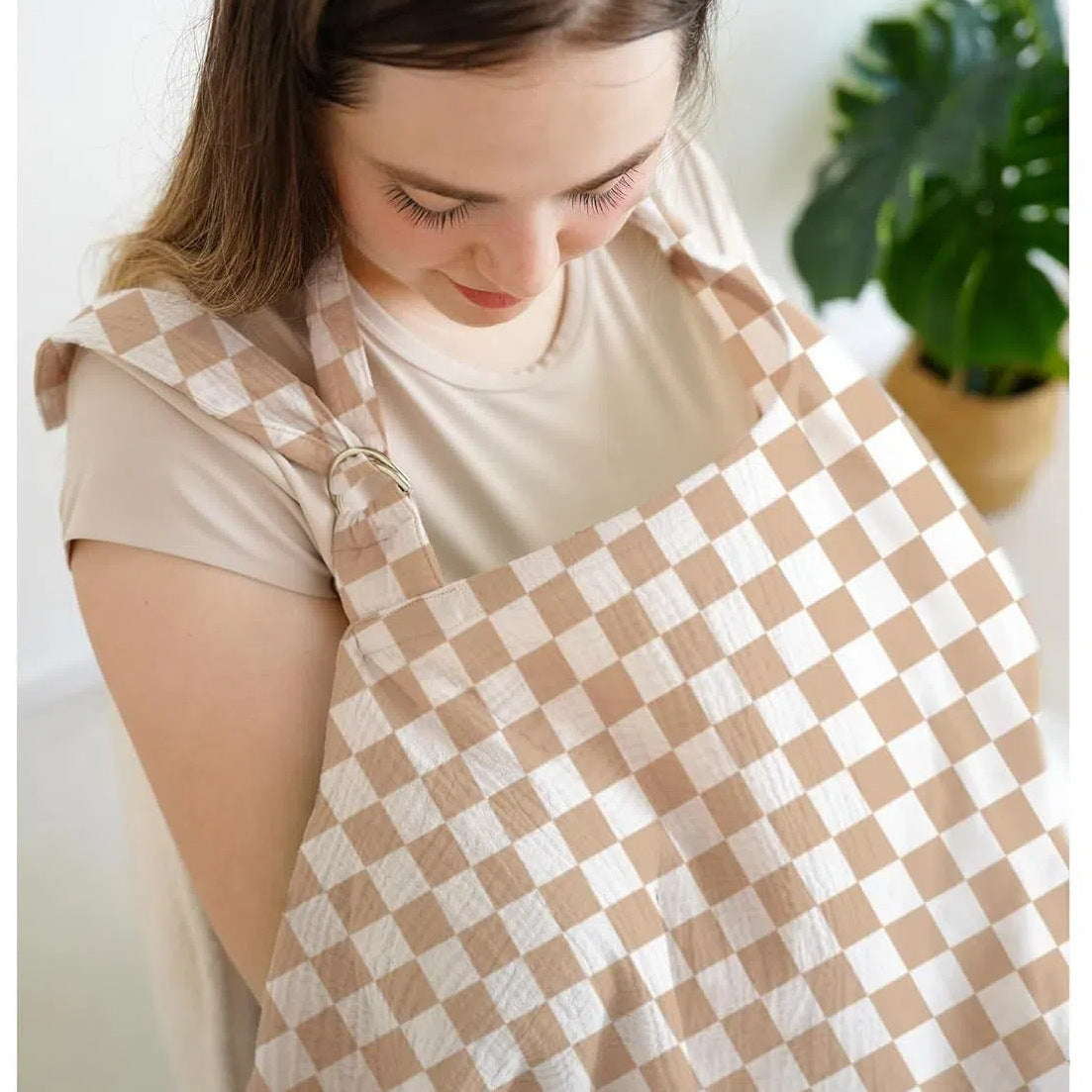 Beige and white checkered nursing cover for breastfeeding with adjustable shoulder strap by Mama's Dream