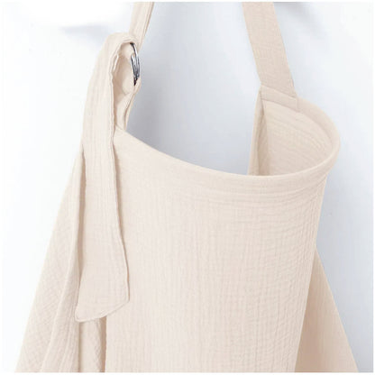 Cream nursing cover for breastfeeding with soft textured fabric and adjustable shoulder strap by Mama's Dream