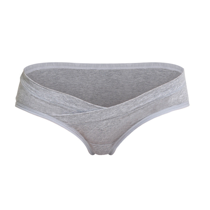 Gray maternity underwear with a crossover waistband that sits below the belly, shown on a white background by Mama's Dream