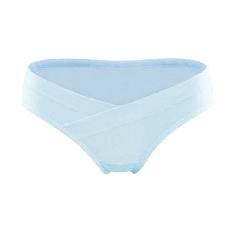 Light blue maternity underwear with a crossover waistband that sits below the belly, shown on a white background by Mama's Dream