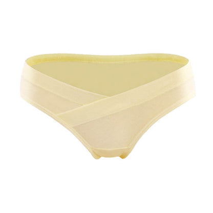 Light yellow maternity underwear with a crossover waistband that sits below the belly, shown on a white background by Mama's Dream