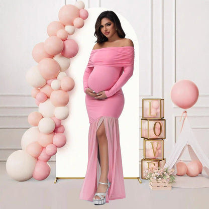 Pink off shoulder maternity mermaid dress with long sleeves and front slit for pregnancy photoshoots by Mama's Dream