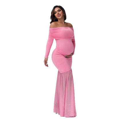 Pink off shoulder maternity mermaid dress with long sleeves for pregnancy photoshoots by Mama's Dream