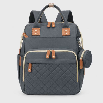 Cloth diaper bag backpack with multiple compartments, side pockets and multiple color options by Mama's Dream