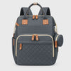 Cloth diaper bag backpack with multiple compartments, side pockets and multiple color options by Mama's Dream