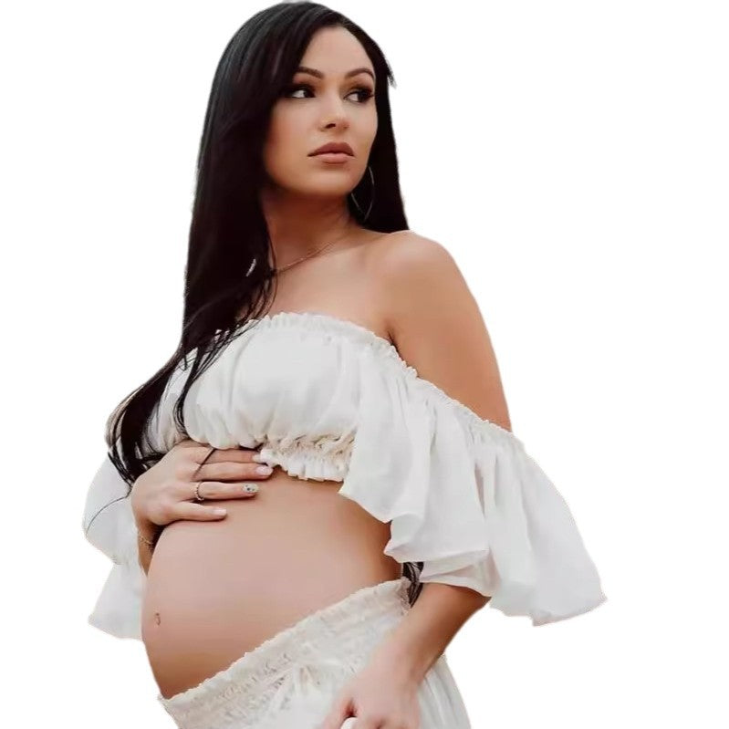 White off shoulder maternity photoshoot outfit with ruffle crop top for pregnancy photography by Mama's Dream